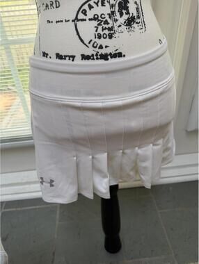 White Under Armour Pleated Skort. Size XS. Excellent Condition!!!
